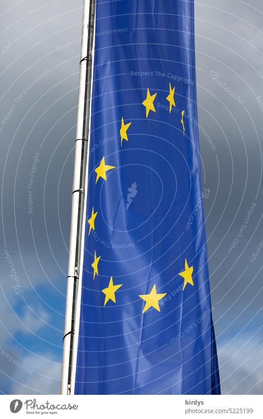 blue europe flag with yellow stars Europe EU European Union EU flag windless European flag Politics and state slack Storm clouds Symbols and metaphors Flagpole