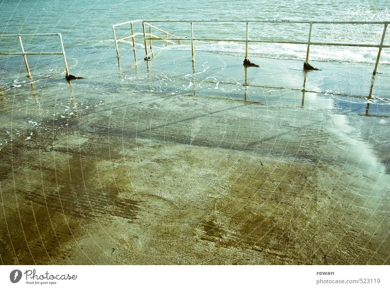 Wet Ocean Handrail Concrete Deluge Water Swimming pool Pool ladder Colour photo Exterior shot Deserted Copy Space left Copy Space right Copy Space middle Day