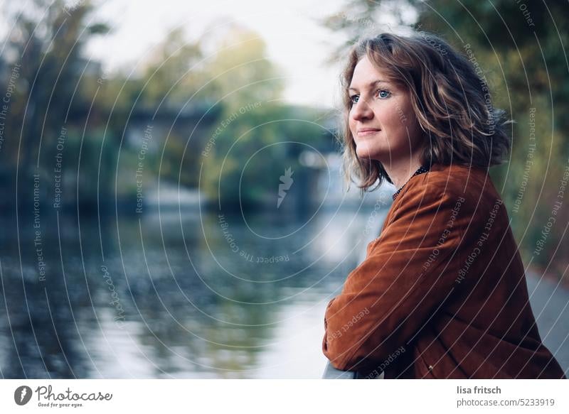 WOMAN - WATER - THOUGHTFUL Woman River Water Green Autumn ponder Observe Longing Nature Exterior shot Think Colour photo Reflection Loneliness 30 - 45 years