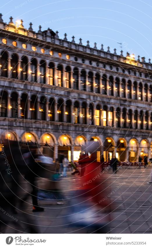 It is evening in the old city, only the tourists are still in a hurry and scurry across the square Evening voyage Tourists Clear Lighting famous