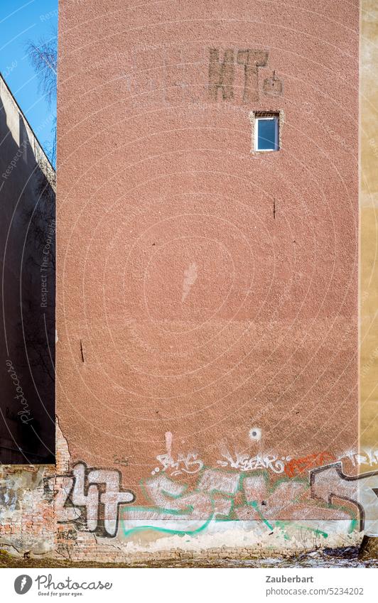 Reddish fire wall, lonely window, graffiti and geometric shapes Fire wall Wall (building) Window Lonely on one's own reddishly Graffiti Vertical Berlin