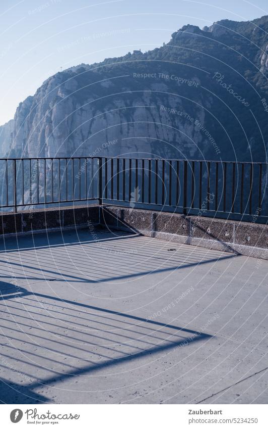 Viewing platform with grids and shadows cast in Montserrat, symbol of blighting nature Platform Vantage point viewing platform Grating Shadow Disfigurement