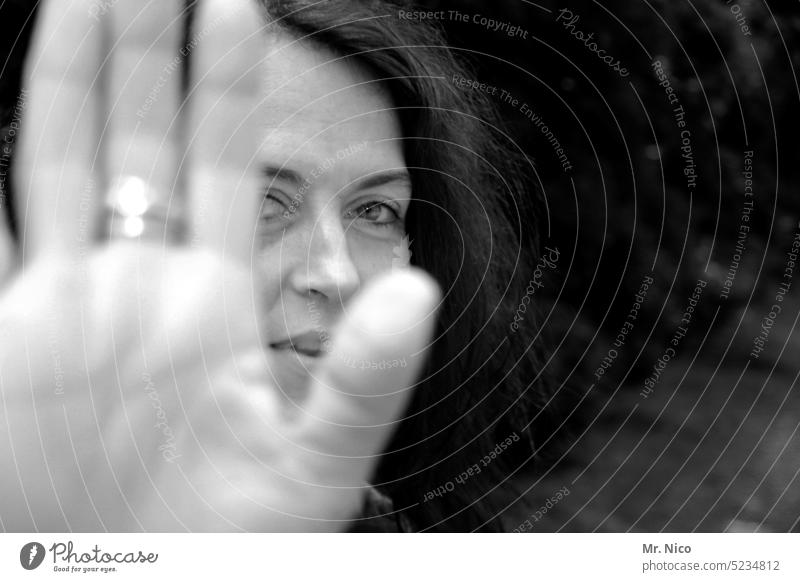 Don't come too close to me! A woman in a defensive posture - a Royalty Free  Stock Photo from Photocase
