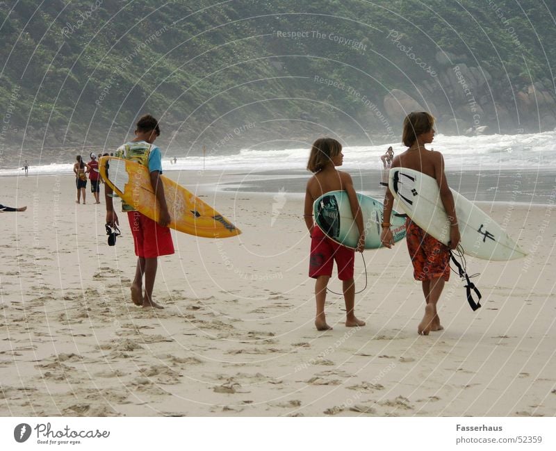 surf kids Surfer Surfing Surfboard Waves Beach Vacation & Travel Brazil Guarujá Sunbathing Child Boy (child) Ocean wave on board vacancy easy Sports Freedom