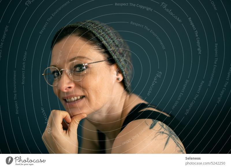 selfie Woman Eyeglasses Face Looking into the camera Cap Tattoo Adults portrait Human being Colour photo Feminine Interior shot Day 30 - 45 years
