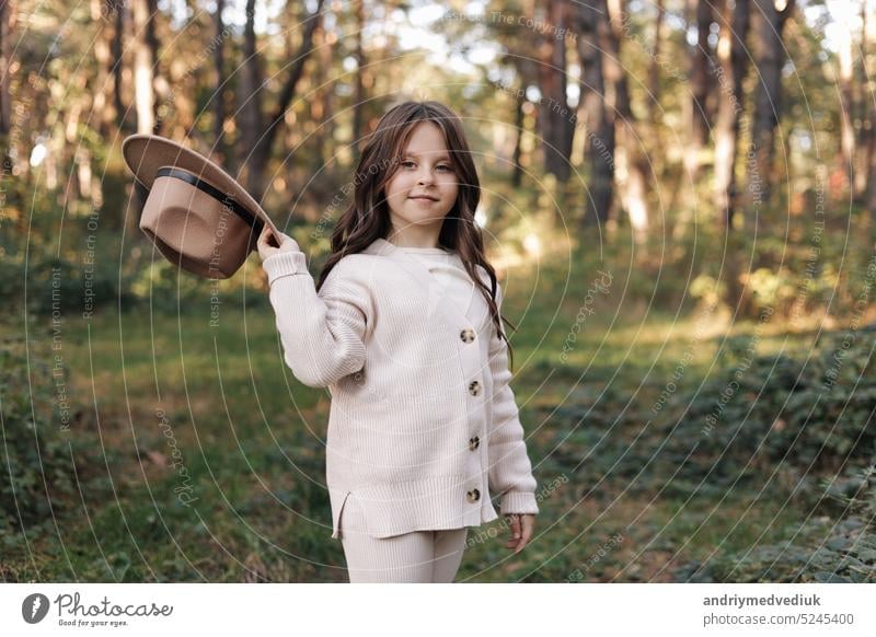 Portrait of smiling little girl in nature stock photo