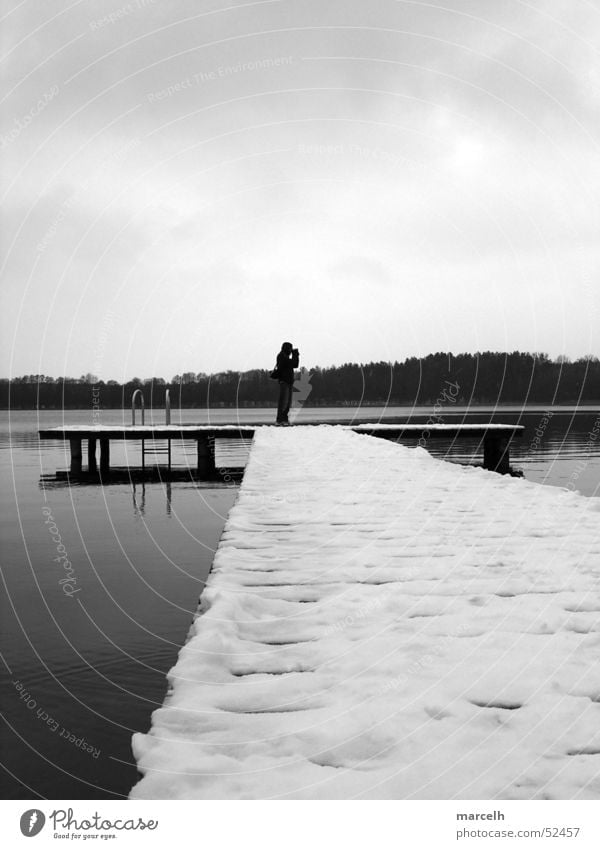 too cold for bathing Lake Footbridge Wood Winter Man Cold Gray Water Snow