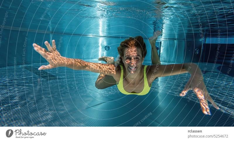 people swimming underwater