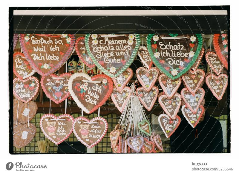 Gingerbread hearts at fair Fairs & Carnivals funfair Heart Candy cute Love Colour photo Kitsch Delicious Nutrition Feasts & Celebrations Romance Icing