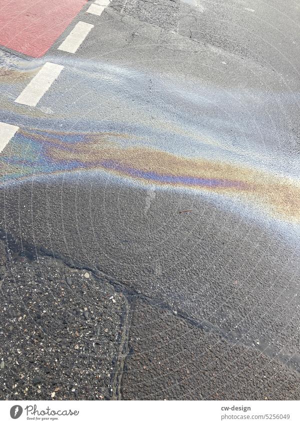 Road surface with oil Cooking oil Pavement Street variegated colored