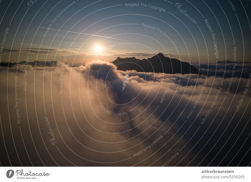 Sunrise on Postalm above the clouds in the mountains photographed with drone sunshine Sunlight sunny Clouds Above the clouds Clouds in the sky Cloud cover