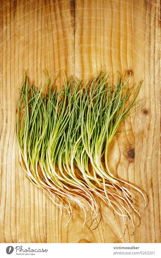 Agretti , salsola soda vegetable food green agretti opposite-leaved saltwort copy space vegetarian diet fresh vegan nobody uncooked edible healthy wooden table