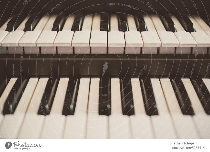 Keyboard keys keyboard piano Double deck sound Music Musical instrument Piano Piano keys Organ Keyboard instrument Make music Detail Close-up Interior shot
