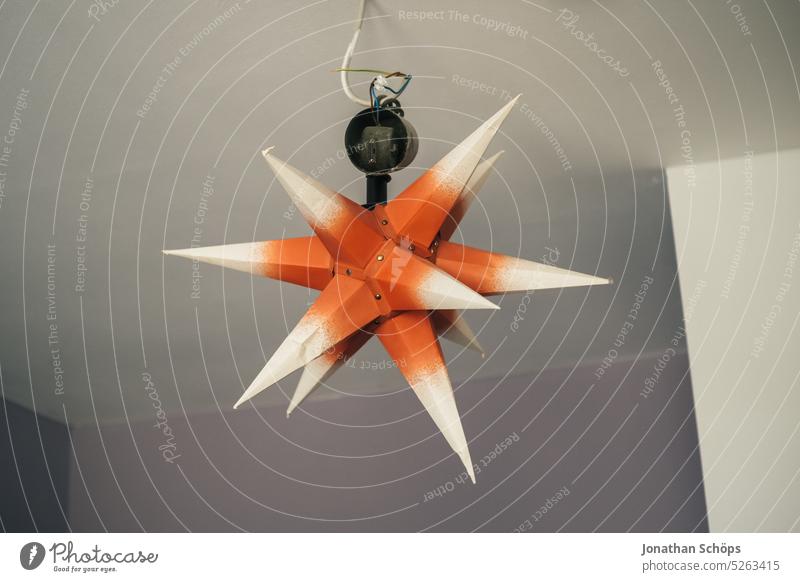 Herrnhut star with bent spike, provisionally hung up Prongs Star (Symbol) Glimmer of hope Religion and faith Christianity Christmas star Herrnhuter Star