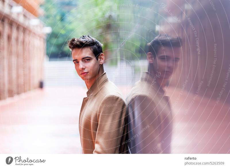 Young handsome male model poses in the Central Park of New York. Outdoor  shot. Stock Photo | Adobe Stock