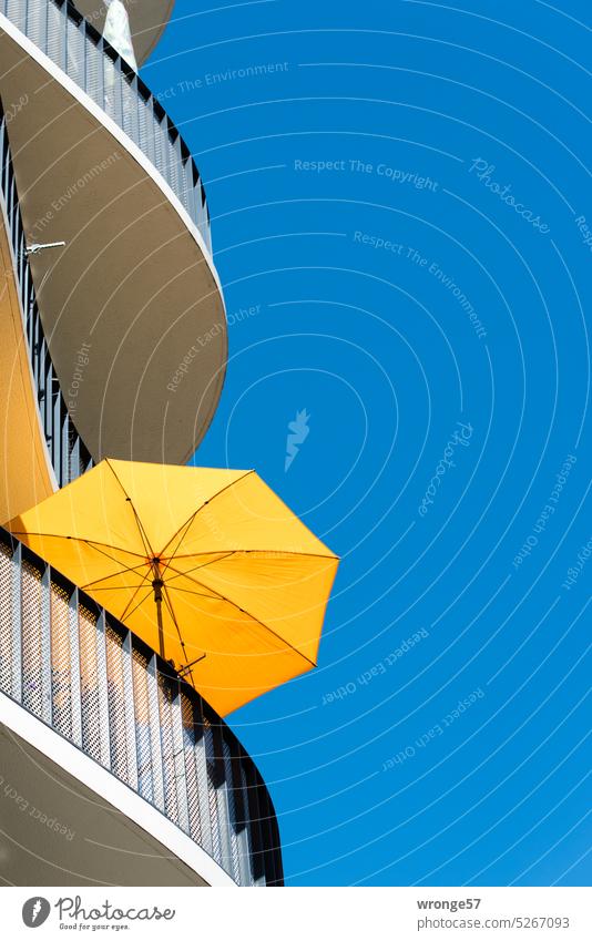 Balcony | open yellow parasol under cloudless blue sky balconies balcony Summer Sun Sunshade Summery Blue sky Cloudless sky Beautiful weather Sky Exterior shot