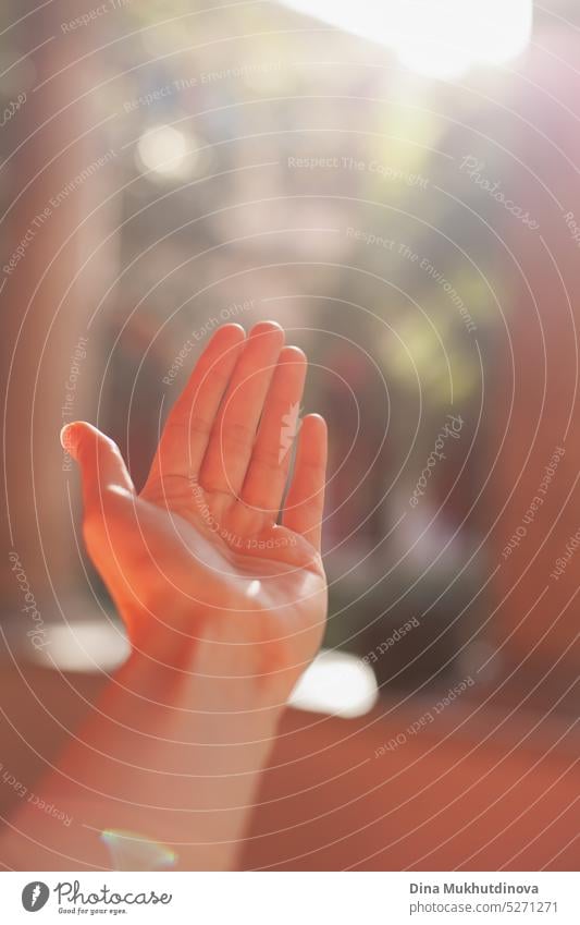 open palm greeting sunlight. Hand in the air with soft light. hand yoga wholesome Conscientiously Consciousness mindfulness exercise Therapy therapeutic Gesture