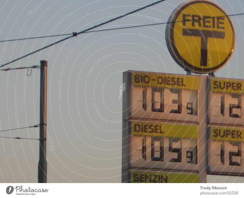 >T< Petrol station Yellow Diesel Liter Gasoline Sky Digits and numbers Cable Great Electricity pylon Blue Signs and labeling Organic produce Price tag