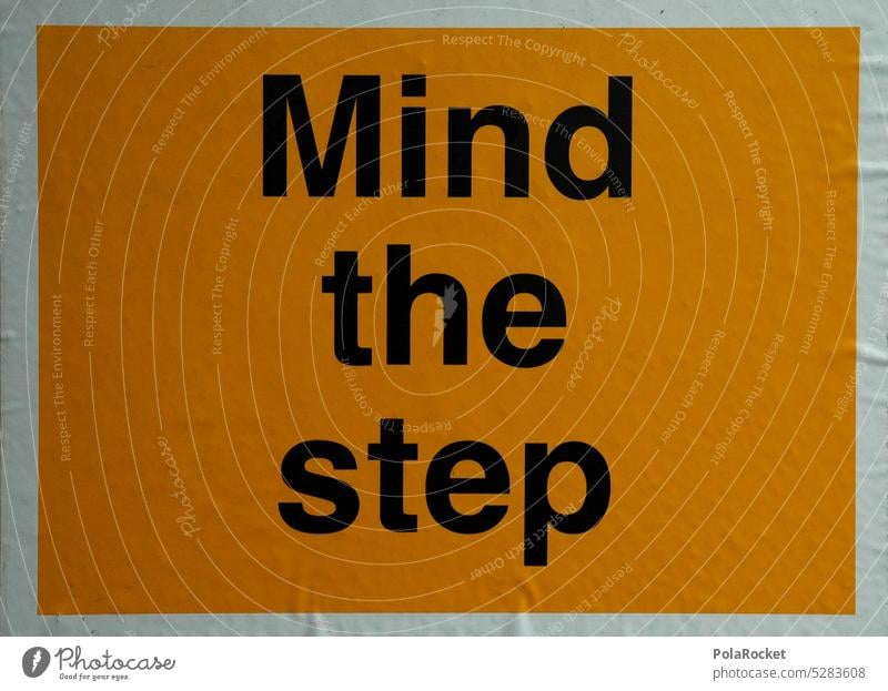 #A0# mind the step Signs and labeling sign mark Signage Clue Text esteem Warn