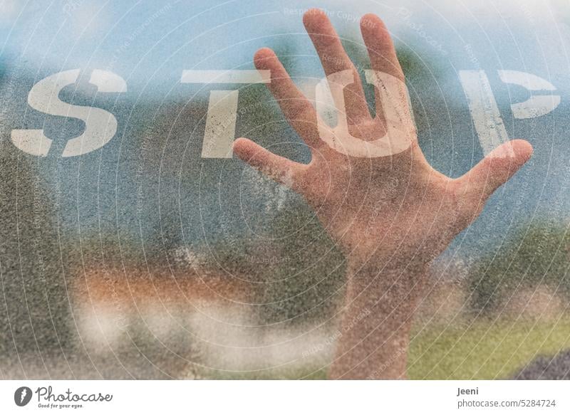 Stop with hand held up mark Text stop Hold Word Sign Safety Clue Double exposure no Cancelation Resolve Decide Emotions Communicate statement Position