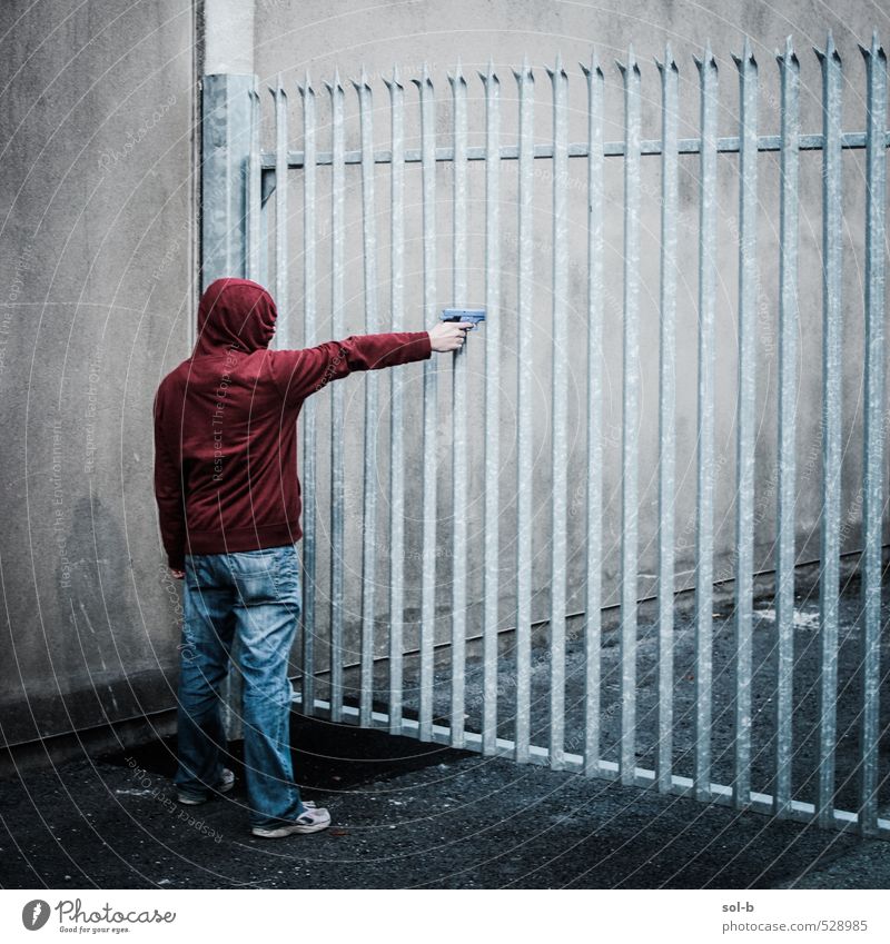 'open up' Human being Masculine Young man Youth (Young adults) Man Adults 1 Actor Downtown Wall (barrier) Wall (building) Gate Barrier Jeans Hooded (clothing)