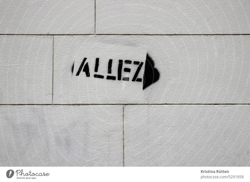 allez stands on the wall of the house alley loose Go goes Forwards hop go ahead invitation Command Action Graffiti Stencil stencil street art Typography Word