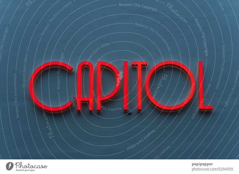 CAPITOL - Neon letters capitol Cinema Cinema lettering Characters writing Typography typography typographically red writing Blue Blue background