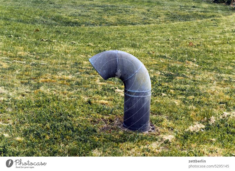 Mysterious tube conduit ventilation Ventilation Warped Curve Earth Meadow Grass Lawn outstanding Iron Metal Steel curvature Curved Radius Arch
