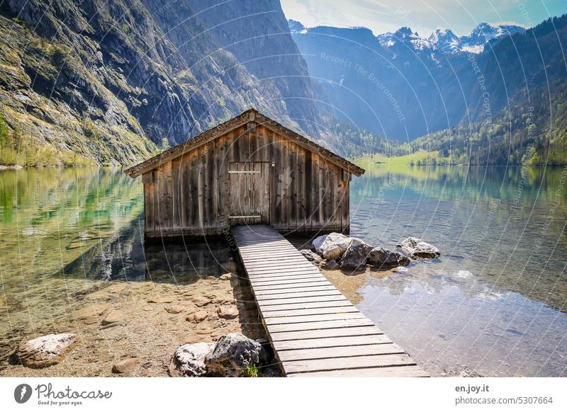 Cottage at the lake Boathouse wooden walkway Hut Wooden house Wooden hut Loneliness Calm Idyll Vacation & Travel Deserted Landscape Relaxation Nature