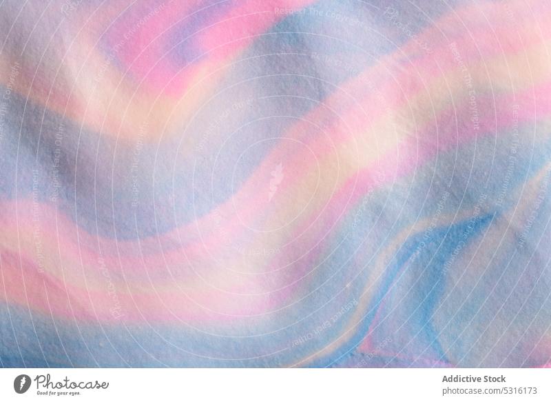 Close-up view of beautiful abstract multicolored waves made from colorful clay plasticine colors mix paint background textured background spills art dye liquid