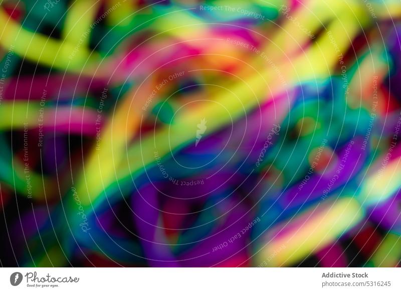 Blurred multicolored lines in background vibrant blur abstract creative spectrum bright design style colorful art mess decoration element twine glow vivid loose