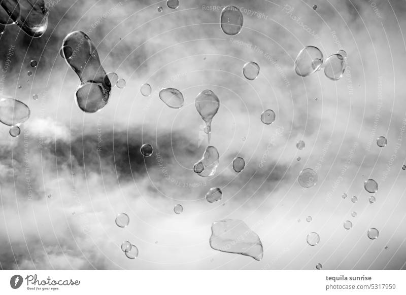 Soap bubbles against cloudy sky soap bubbles Black & white photo Sky Clouds Microscope Blow