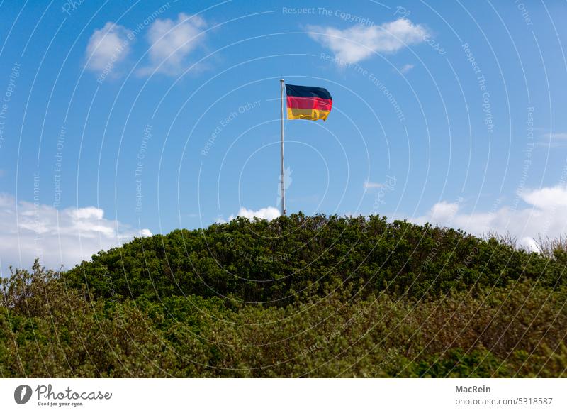 Germany flag on a hill Flag germany flag green hill Hill elevation mountain nobody Deserted Exterior shot symbol picture