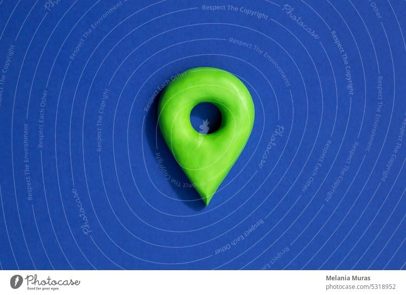 Green location symbol of pin on blue background, 3d GPS pin icon, location concept. abstract address button cartography color design destination direction