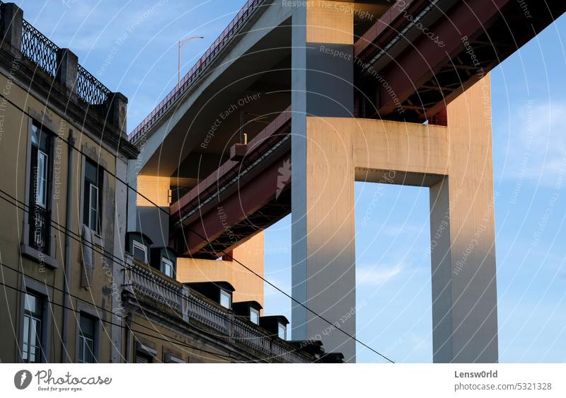 Part of the 25 de Abril Bridge suspension bridge leading through the city of Lisbon lisbon Portugal Vacation & Travel Suspension bridge 25 de abril bridge