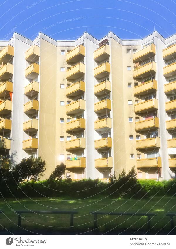 block of flats Old building on the outside Balcony Story Facade Window House (Residential Structure) Sky Sky blue Courtyard Interior courtyard downtown Kiez