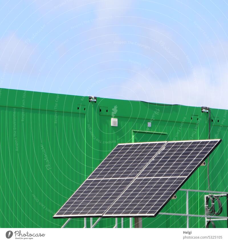 Solar panel in front of a construction container for power generation solar panel Solar cell Solar Power Energy generation Power Generation Construction site