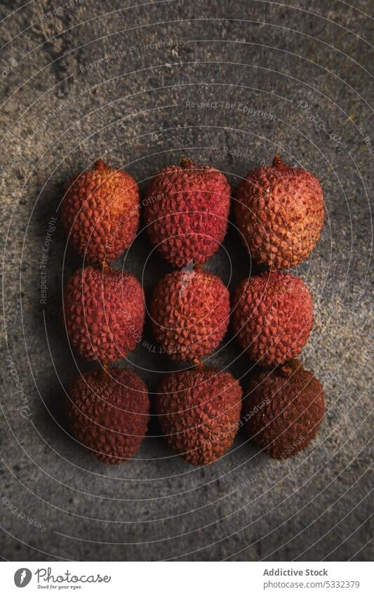 Fresh and ripe lychee fruit on brown rustic surface delicious table healthy organic fresh natural vitamin beverage diet refreshment drink sweet tasty yummy