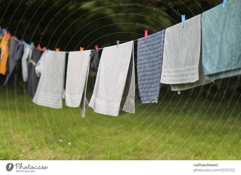 Laundry drying on line Deserted White Colour photo Hang up Exterior shot Holder Clothing Washing Washing day Dry Domestic Life General real life housework