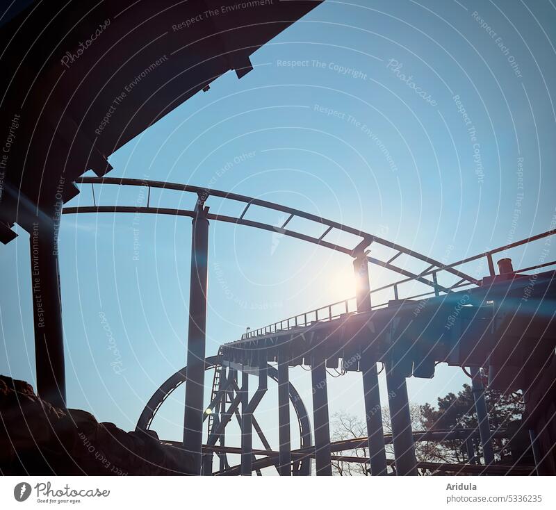 Roller coaster, blue sky, back light leisure park Fairs & Carnivals funfair Sky Leisure and hobbies Amusement Park Theme-park rides Action Movement Metal Steel