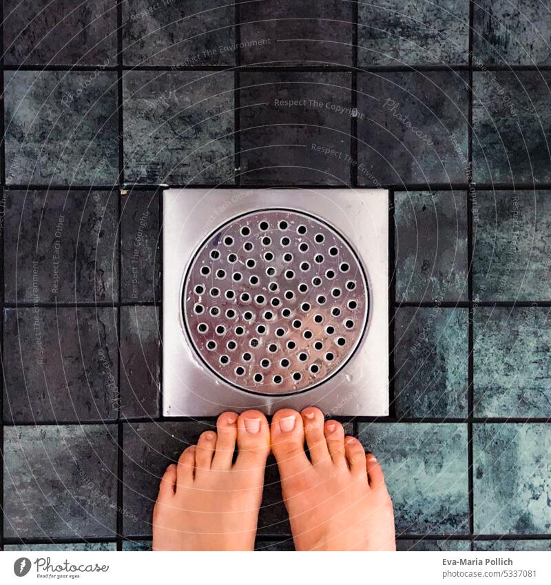 naked feet of woman in shower with blue tiles Feet bubble head Water selfcare Personal hygiene Shower room Blue nurse Clean Silver cleaning polish Wet Self-care