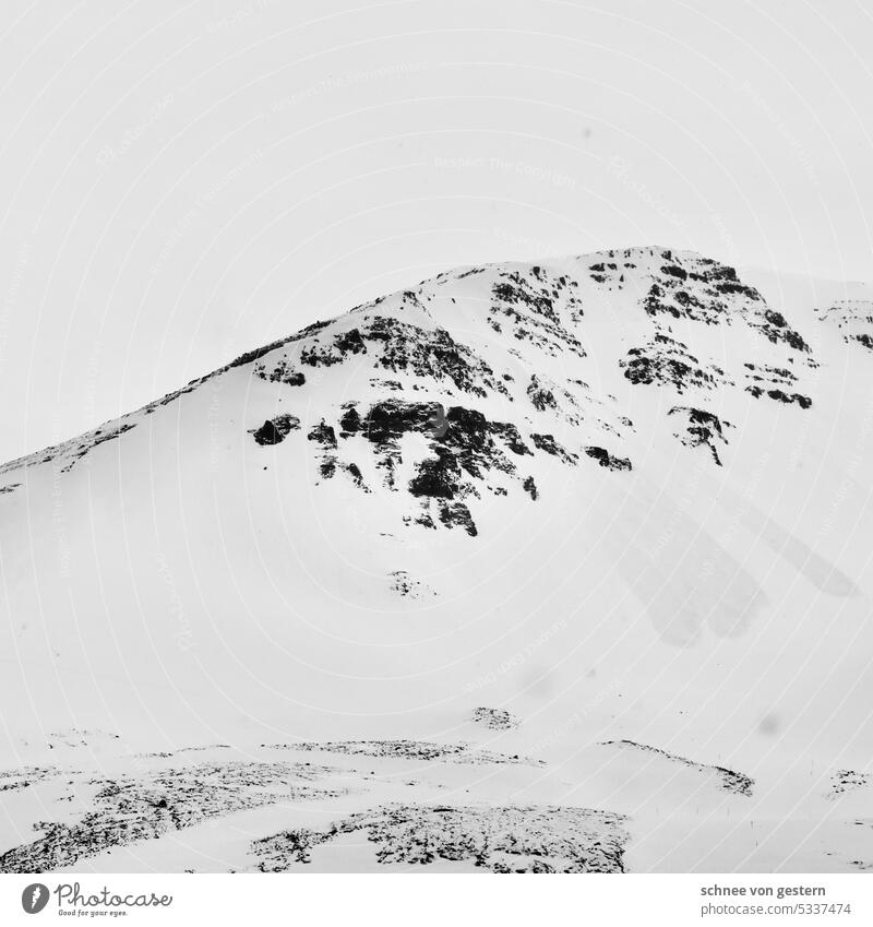 Snow and mountains in iceland II Iceland Exterior shot Nature Landscape Mountain Water Environment Day Deserted Rock Elements Wild Moody Climate Cold Sky Hill