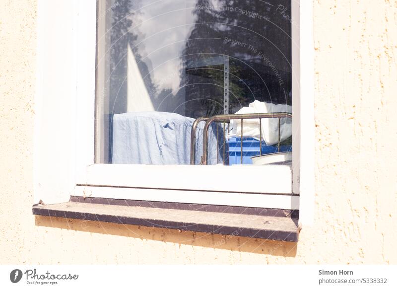 View through window shows still life from laundry, boxes and transport trolleys Window Insight Laundry Wash Industrial crates care Look after Care work Clean