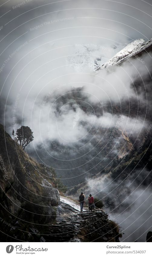 path Human being Nature Landscape Elements Sky Storm clouds Autumn Fog Rock Mountain Snowcapped peak Nepal Esthetic Exceptional Fantastic Emotions Moody Power