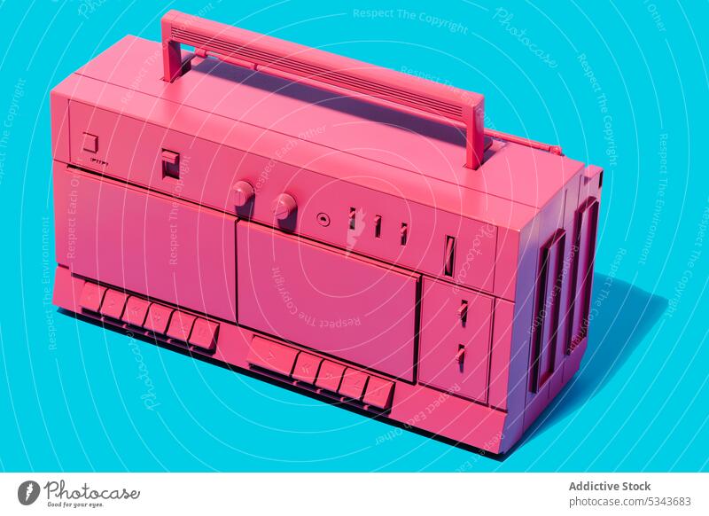 Vintage pink boombox against blue background recorder cassette retro stereo music tape nostalgia sound radio object vintage audio analog song plastic 80s melody