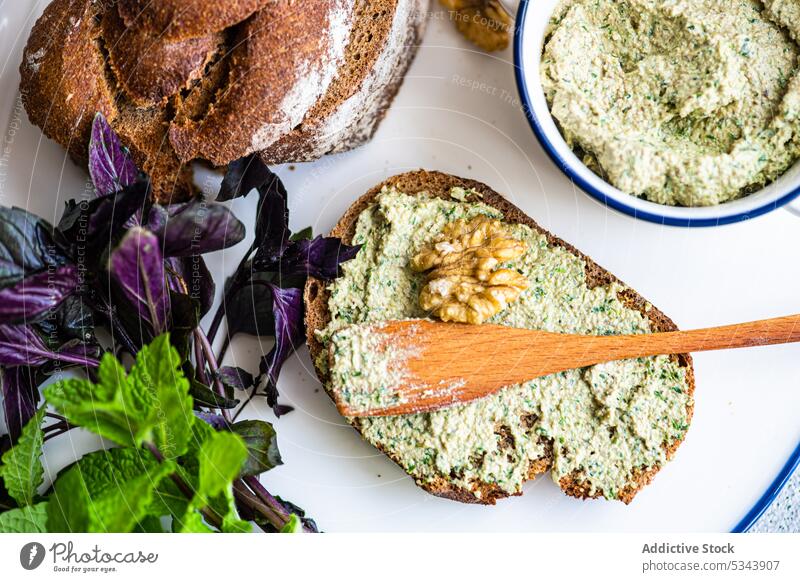 Healthy rye bread and walnut sauce Caucasus basil bowl breakfast cuisine cutting board eat eating food fresh georgia georgian healthy herb meal mint organic