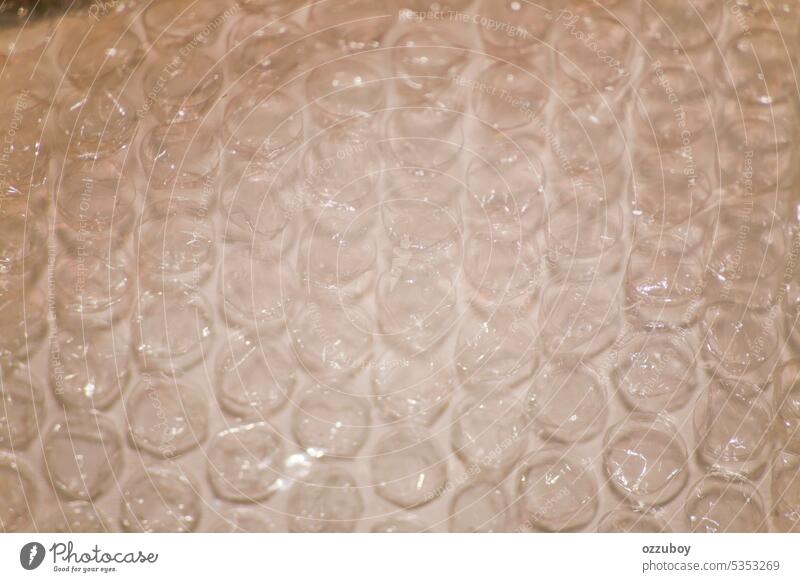 Close up of bubble wrap material plastic texture background package safety transparent abstract air pattern cargo delivery pop post protection secure shipping