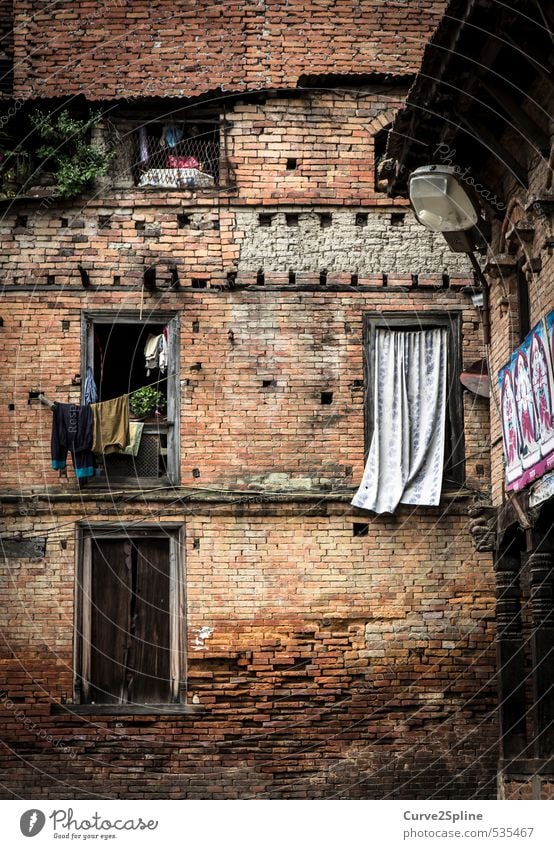 The Face of Kathmandu Nepal Capital city Outskirts High-rise Building Wall (barrier) Wall (building) Window Poverty Simple Brown Orange Culture Flat (apartment)