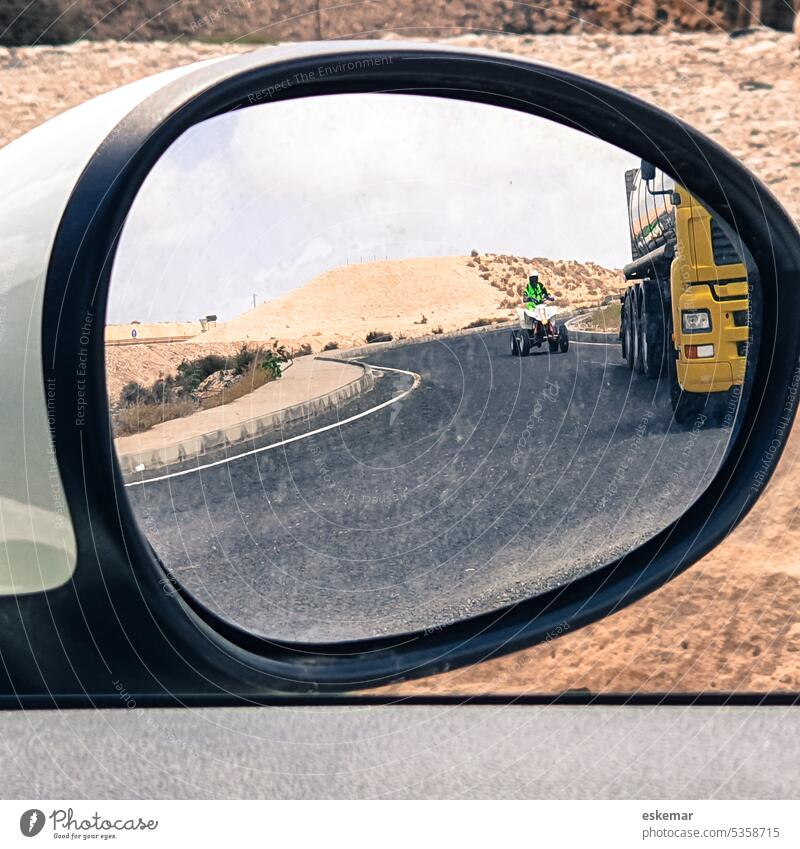 Quad bike and truck in rear view mirror of car, Fuerteventura Transport Mirror Rear view mirror lorry Vice Carriage Desert Means of transport Driving Street