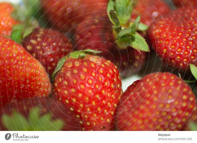 Background of red strawberries . White background vegetarian freshness juicy tasty macro natural nature health organic sweet berry breakfast close up closeup